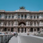Capture of Rome's iconic Palace of Justice on a sunny day, showcasing its architectural splendor.